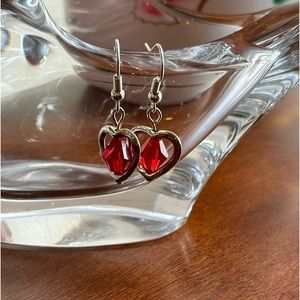 Silver heart earings  with a red heart inside